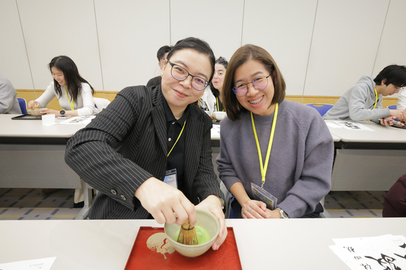 Participants preparing and enjoying a tea ceremony