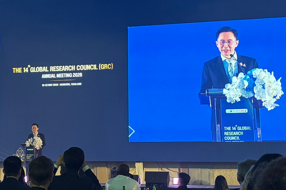 Speaker addressing participants at the conference