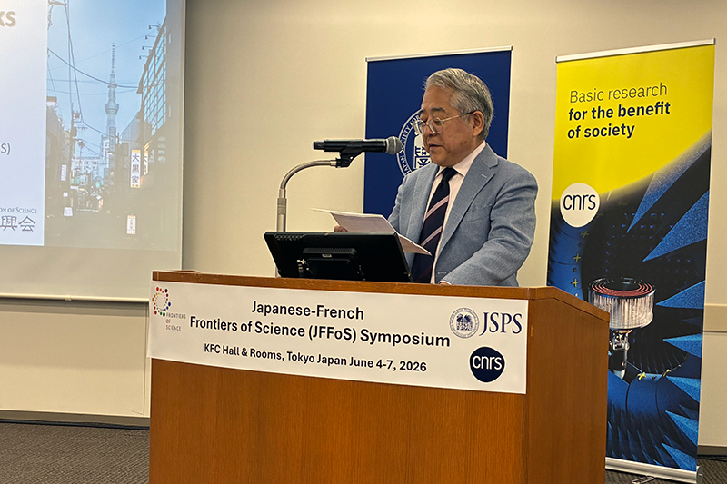 President SUGINO delivers opening remarks at the podium.