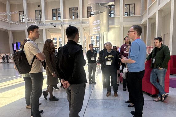 Participants listening to a guide at the Humboldt Forum.